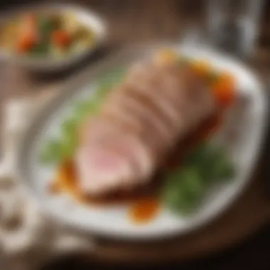 Elegant presentation of sliced pork tenderloin on a plate with garnishes