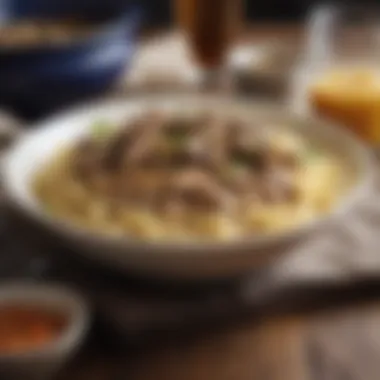 A beautifully plated bowl of beef stroganoff with a side of egg noodles