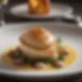 An elegant presentation of Coquille San Jacques in a gourmet setting