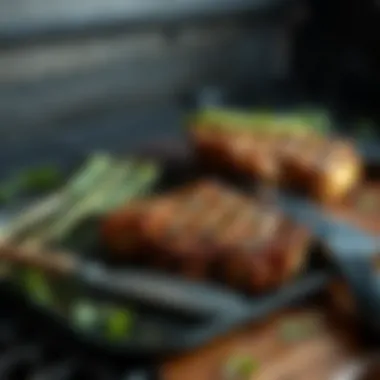 Essential grilling tools laid out for steak preparation