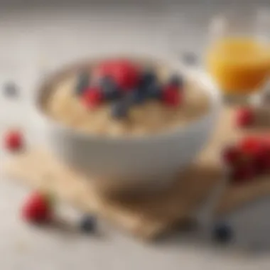 A bowl of oatmeal topped with fresh berries and honey