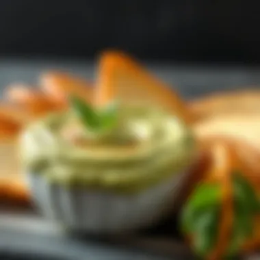 Creamy avocado dip garnished with fresh herbs