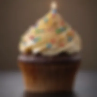 Close-up of a cupcake decorated with birthday-themed designs