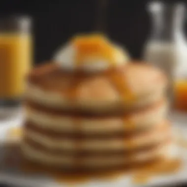 A plate of fluffy gluten-free pancakes drizzled with maple syrup