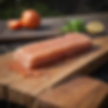 Himalayan Salt Plank in Outdoor Cooking Environment Himalayan BBQ salt plank placed in an outdoor setting with a grill and fresh ingredients.