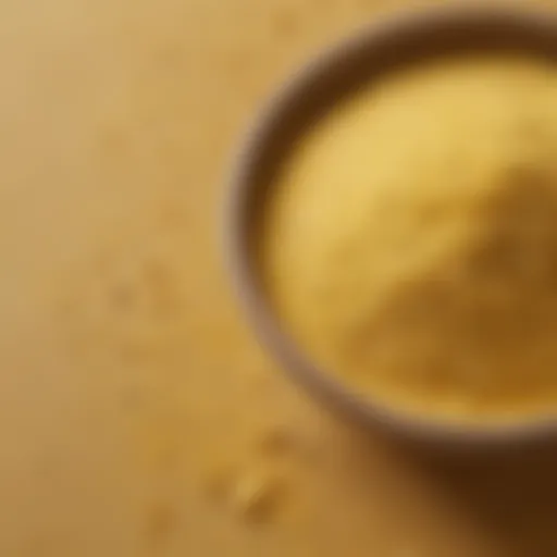 A bowl of Hoovers cornmeal showcasing its fine texture and yellow hue.