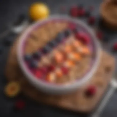 A vibrant smoothie bowl made with huckleberries and chocolate topped with granola and fresh fruits.