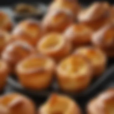 A tray filled with freshly baked popovers, golden and fluffy