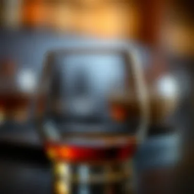 Close-up of a glass filled with Lochan Ora Whisky, revealing its rich color