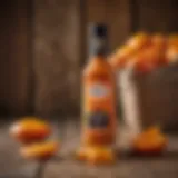 A vibrant bottle of mango habanero wing sauce against a rustic wooden background.