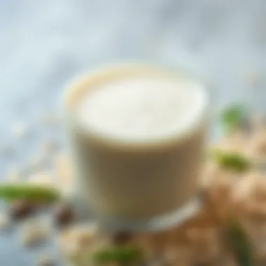 Oat milk with oats scattered around and a hint of green