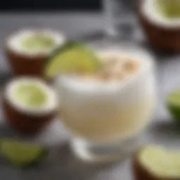 A vibrant coconut margarita garnished with a lime slice and coconut flakes