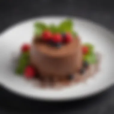 Garnished Chocolate Mousse Delight Chocolate mousse garnished with fresh berries and mint leaves