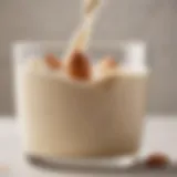 A close-up of evaporated almond milk in a glass, showcasing its creamy texture.