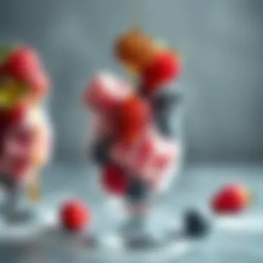 A close-up of frozen berries drizzled with honey, elegantly presented in a clear cup.