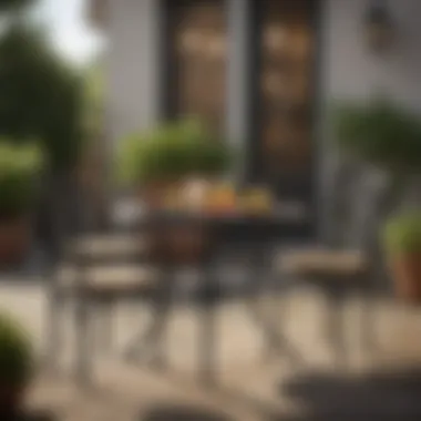 Elegant Table Arrangement Elegant small patio table arrangement with decorative elements and two chairs