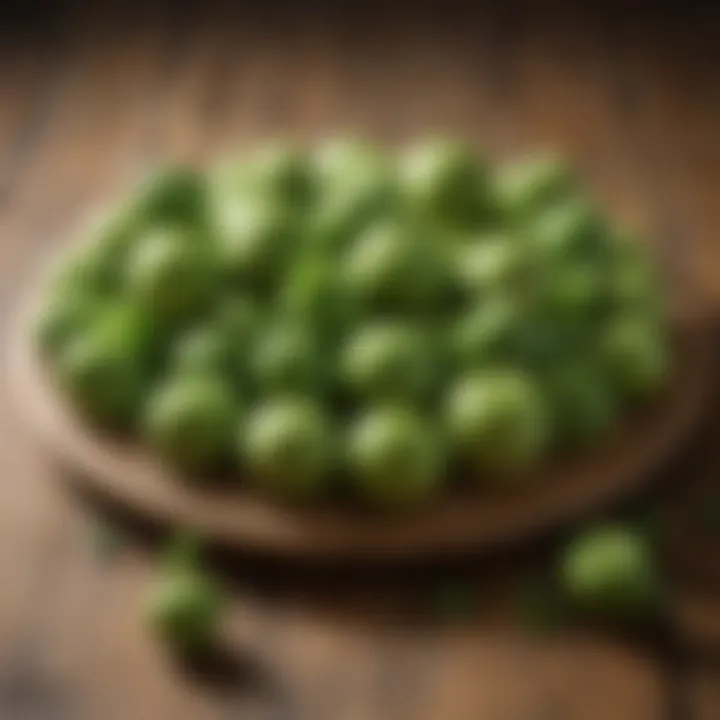 An array of green fruits on a wooden table