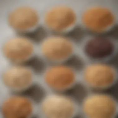 A close-up view of different types of oats in glass bowls.