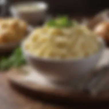 Creamy mashed potatoes in a bowl garnished with herbs