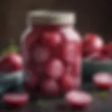 Vibrant pickled red onions in a glass jar