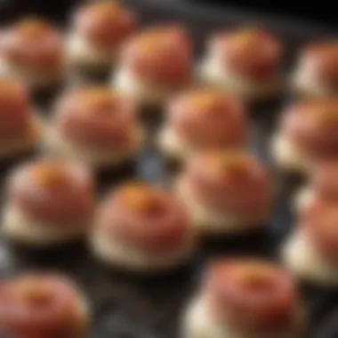 Bacon-Wrapped Scallops Ready for the Oven An oven tray filled with bacon-wrapped scallops ready for baking