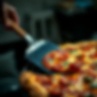 A pizza peel with a freshly baked pizza being slid onto a serving surface.