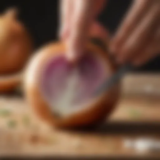 Close-up of a sharp knife cutting through an onion