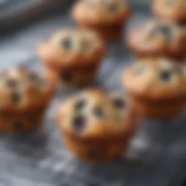 Freshly baked blueberry muffins on a cooling rack