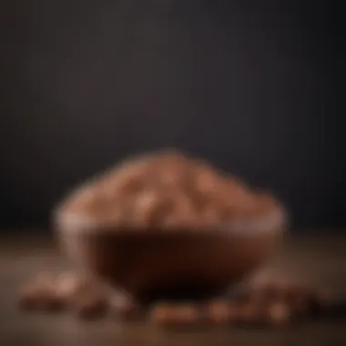 An artistic arrangement of chocolate coated peanuts in a decorative bowl