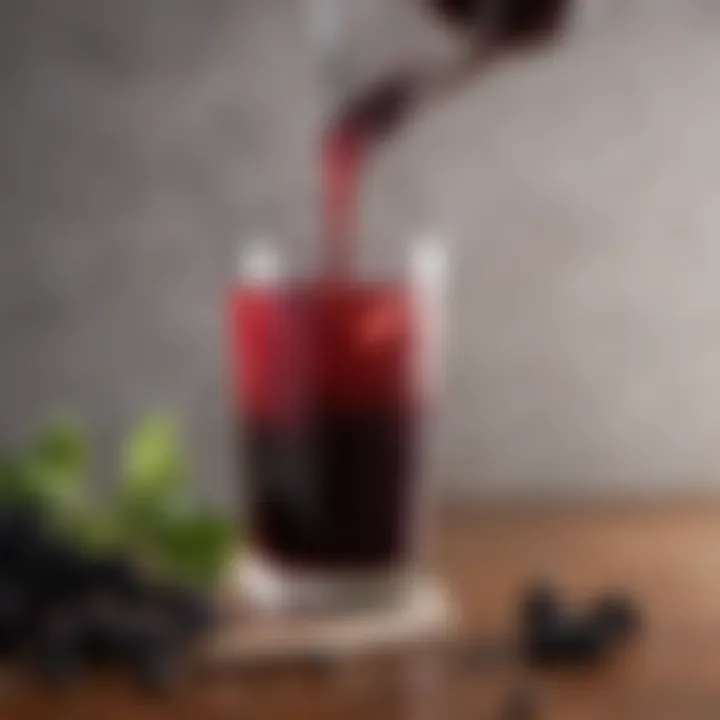 Elderberry syrup pouring into a glass