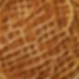 A close-up of waffle mix in a bowl, highlighting its texture and color.