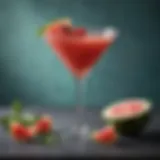 A vibrant and refreshing Watermelon Vodka Martini garnished with a mint sprig