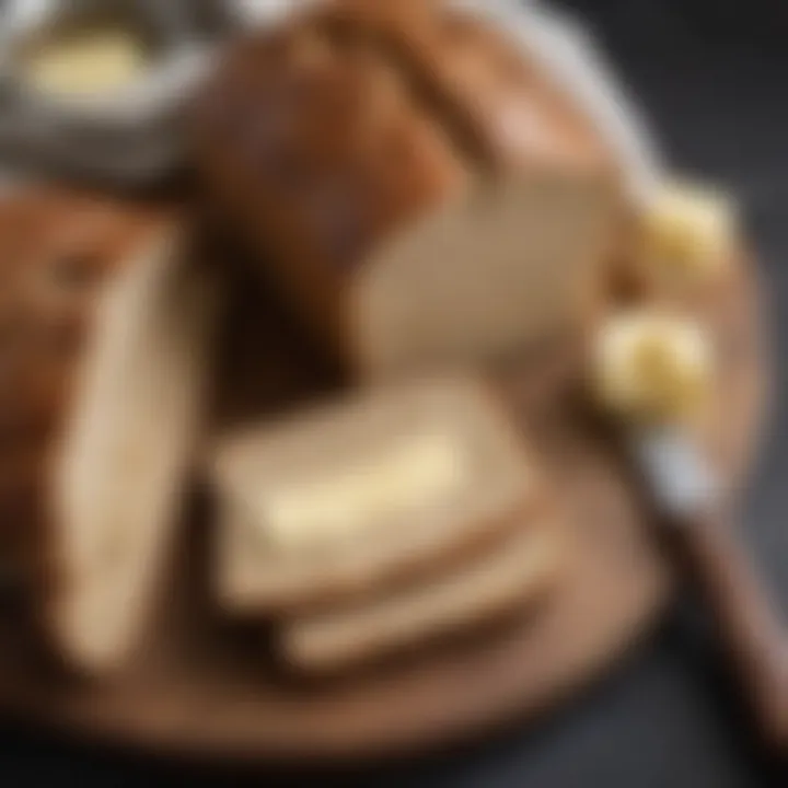 Sliced oat bread with a spread of natural butter